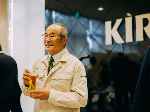 Junpei Abe, Chairman of the Tono Hop Agricultural Cooperative, giving a toast